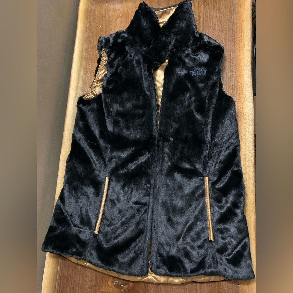 North Face reversible vest. Black and gold.
